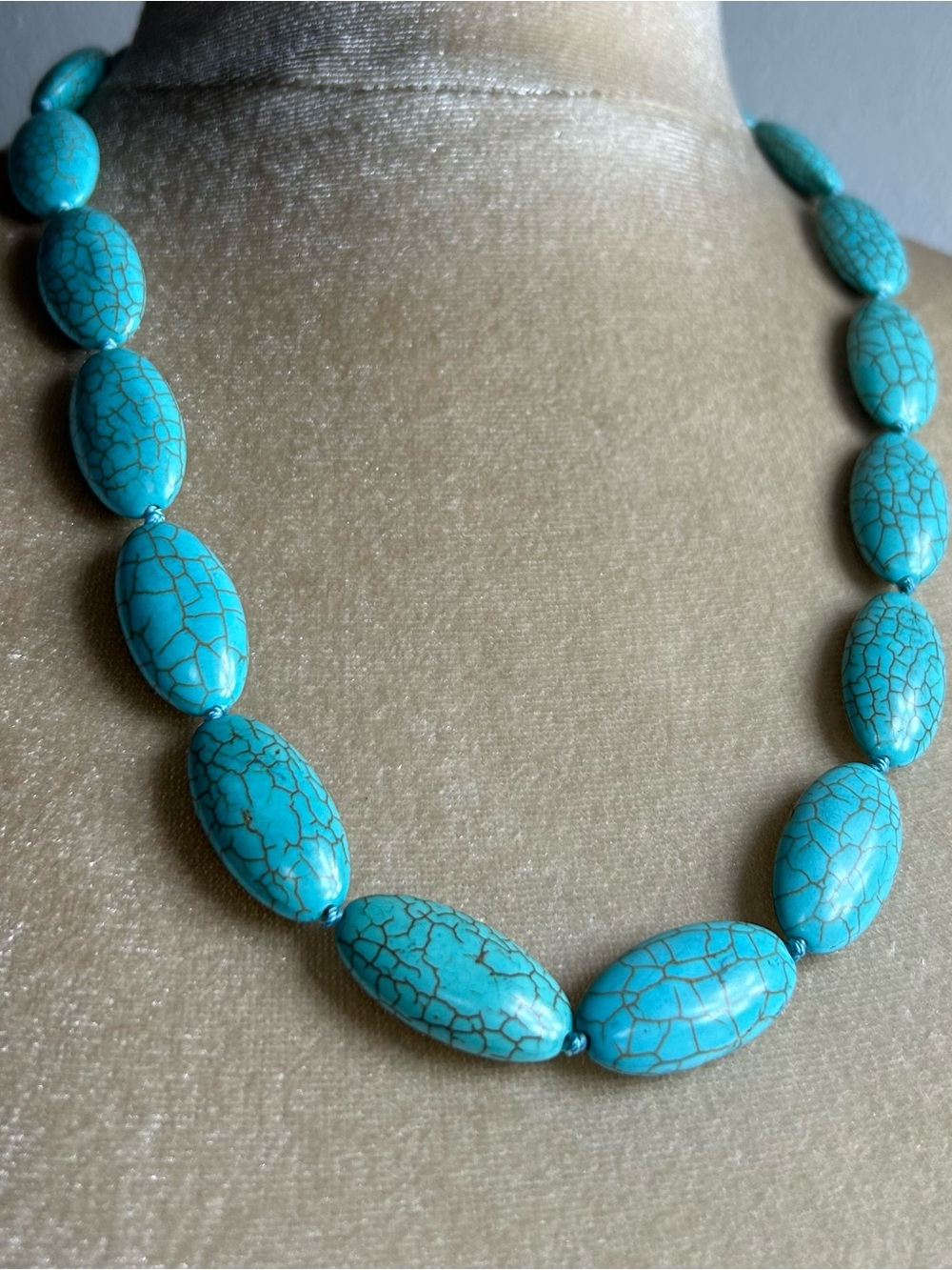 Blue elongated oval beaded howlite knotted necklace